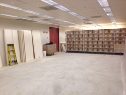 Half of archives taken down to bare concrete floors.